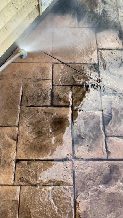 Surface cleaning stamped concrete under pressure